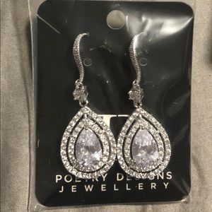 Poetry designs earrings from David‘a bridal
